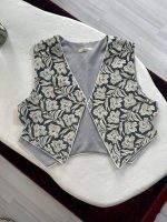 جلیقه بوسه - تصویر 2